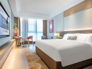 Letto o letti in una camera di Echeng Hotel - Huawei Base Store in Shenzhen