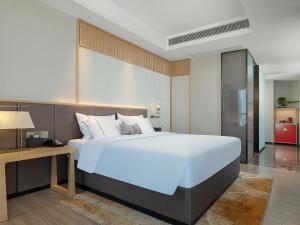 Letto o letti in una camera di Echeng Hotel - Huawei Base Store in Shenzhen