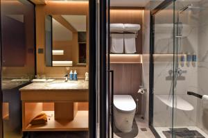 Bilik mandi di Maison New Century Tongxiang