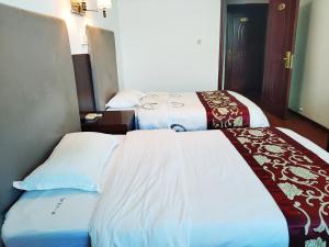 张家界大庸家民宿天门山索道站店DYJ Residential hostel客房内的一张或多张床位
