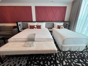 Postel nebo postele na pokoji v ubytování Resorts World Genting - Crockfords