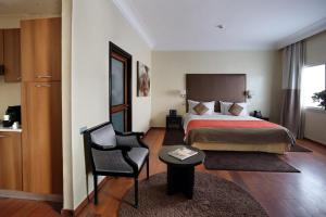 Postel nebo postele na pokoji v ubytování Park Suites Hotel Luxury Boutique Hotel