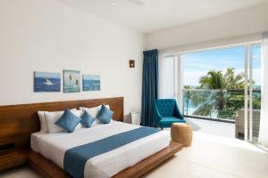 Letto o letti in una camera di Vis Ta Vie -Thema Collection