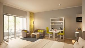 uma pequena sala de estar com mesa e cadeiras em Adapt Apartments Wetzlar em Wetzlar