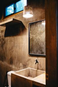 Ванна кімната в The Ohm Siargao Resort