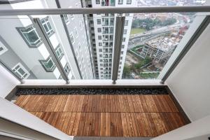an empty balcony with a view of a building at Tranquil Retreats in Kuala Lumpur