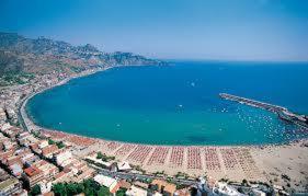 an aerial view of a beach and the ocean at Estrellas De Mar Casa in Giardini Naxos