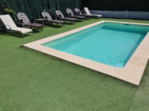 Bazén v ubytování Villa climatisée bord de mer avec piscine privée nebo v jeho okolí