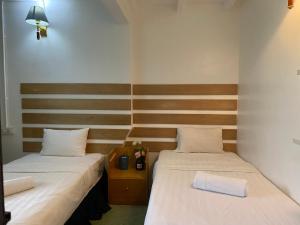 Ένα ή περισσότερα κρεβάτια σε δωμάτιο στο Cheras homestay @kelian