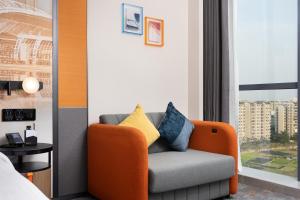 Zona d'estar a Hampton by Hilton Guangzhou Renhe Baiyun Airport-Free Shuttle bus at Guangzhou Baiyun Airport