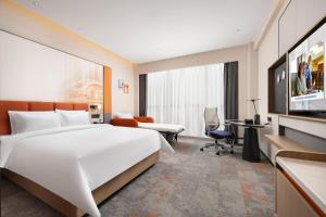 Televisor o centre d'entreteniment de Hampton by Hilton Guangzhou Renhe Baiyun Airport-Free Shuttle bus at Guangzhou Baiyun Airport