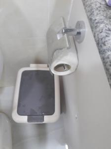 a bathroom with a toilet with a urinal at Fulidhoo Hathaa Retreat in Fulidhoo +32 photos