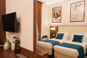 Letto o letti in una camera di Archi di Roma Guest House