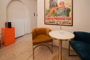 Area soggiorno di Archi di Roma Guest House