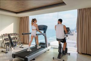 Fitness centrum a/nebo fitness zařízení v ubytování A La Carte Da Nang Beach