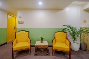 Posezení v ubytování Bloom Hotel - Karol Bagh + 9 fotografií