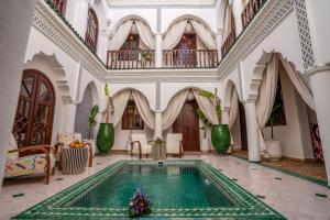 Bazén v ubytování Riad Ekla Boutique Hotel nebo v jeho okolí