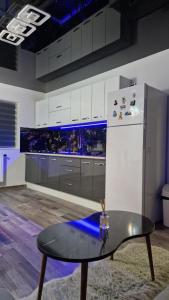 Η κουζίνα ή μικρή κουζίνα στο Apartamentul ALEX