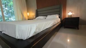 Ένα ή περισσότερα κρεβάτια σε δωμάτιο στο Ashirvad