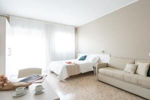 A bed or beds in a room at Residence Sabrina