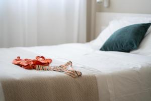 A bed or beds in a room at Residence Sabrina