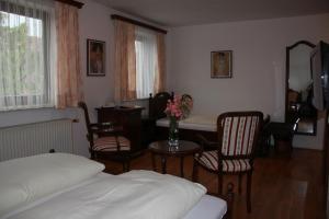 Postel nebo postele na pokoji v ubytování Landhotel St. Florian