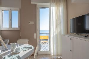 A television and/or entertainment centre at Residence Sabrina