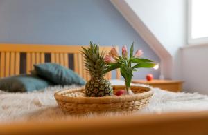 Ein Bett oder Betten in einem Zimmer der Unterkunft Villa Frisia Nr 29