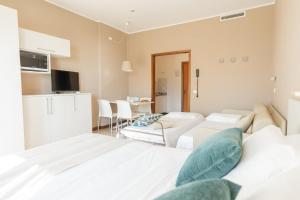 A bed or beds in a room at Residence Sabrina
