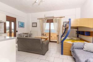 Postel nebo postele na pokoji v ubytování Alexander Beach Hotel