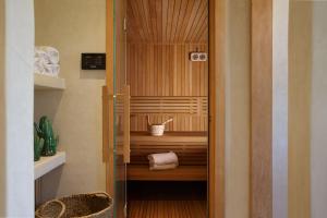 a wooden door with a bowl in a sauna at Villa MISH-MISH in Marrakesh +106 photos