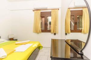 Postel nebo postele na pokoji v ubytování Alexander Beach Hotel
