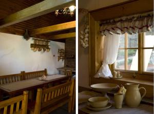 una cucina con tavolo e una finestra in una camera di Vila 3 Stromy sk a Modra