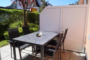 Fotografie z fotogalerie ubytování Großzügige Whg. mit verglaster Veranda, geschützter Terrasse v destinaci Kühlungsborn