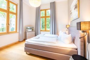 Voodi või voodid majutusasutuse Designerwohnung in alter Villa für Familien, mit Terrasse und 2 Schlafzimmern toas