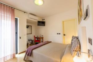 TV a/nebo společenská místnost v ubytování Hotel Paistos Paestum