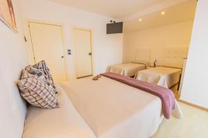 Postel nebo postele na pokoji v ubytování Hotel Paistos Paestum