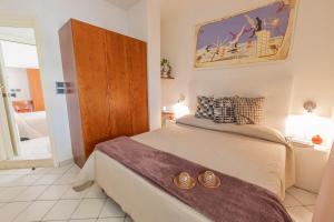 Postel nebo postele na pokoji v ubytování Hotel Paistos Paestum