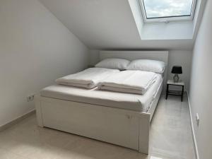 Postel nebo postele na pokoji v ubytování DG-Wohnung in Starnberg Nord
