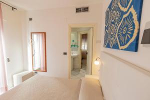Postel nebo postele na pokoji v ubytování Hotel Paistos Paestum