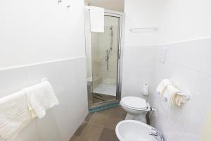 Koupelna v ubytování Hotel Paistos Paestum