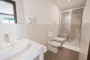 Koupelna v ubytování Hotel Paistos Paestum