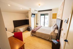 Postel nebo postele na pokoji v ubytování Hotel Paistos Paestum