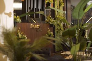 a entrance to a flower shop with plants at Ramada by Wyndham Istanbul Merter in Istanbul