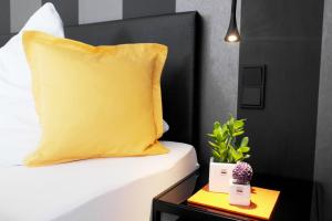 Postel nebo postele na pokoji v ubytování Hotel Blauer Fasan