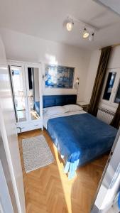 Apartment Artemisia 1 tesisinde bir odada yatak veya yataklar