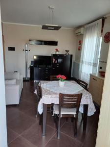 A kitchen or kitchenette at NSM Casa di Fulmine attico con box privato