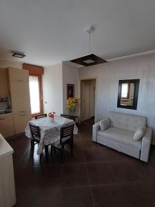 A seating area at NSM Casa di Fulmine attico con box privato