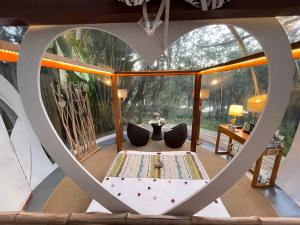 Istumisnurk majutusasutuses Bubble Lodge Bois Chéri Plantation