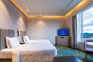 Holiday Inn Katra Vaishno Devi by IHG客房内的一张或多张床位
